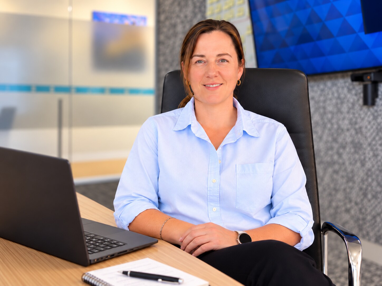 Nexus principal consultant seated in an office meeting room